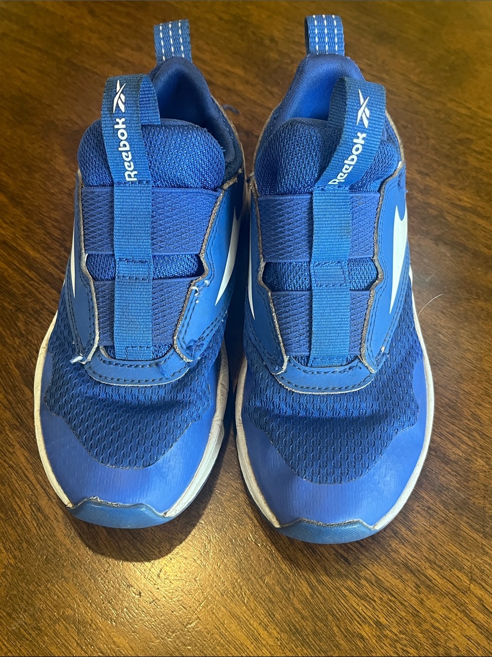 Reebok Kids size 12 Blue and White Slip-On Athletic Sneakers
